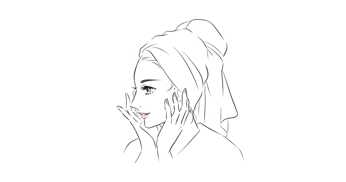 40代女性が朝の光の中で薬用美白乳液をなじませる様子のイメージ